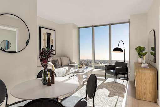 a living room with a view and a table and chairs at The Paxton, Brooklyn, NY