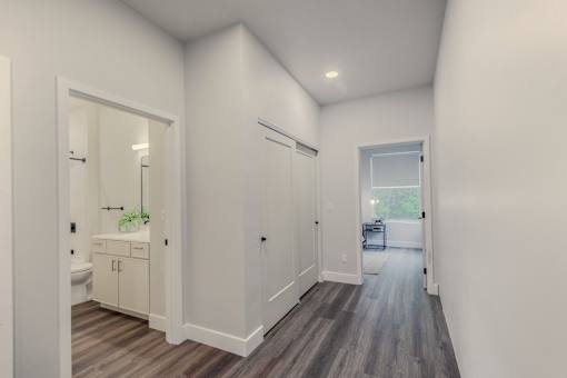 A bathroom with a toilet, sink, and bathtub.