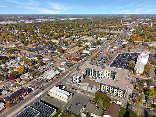 A cityscape with buildings and roads.