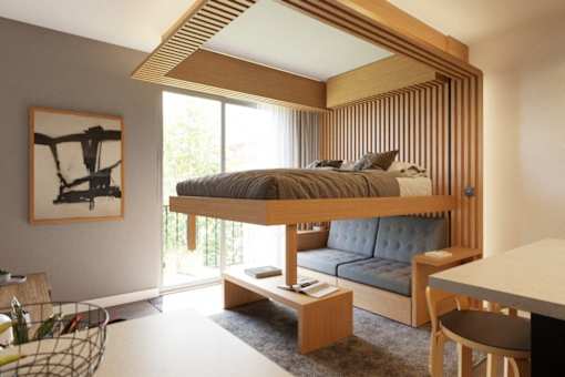 A modern bedroom with a canopy bed and a painting on the wall.