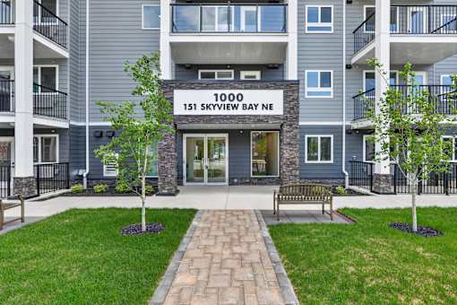 The front of apartment building 1000 at 151 Skyview Bay Northeast.