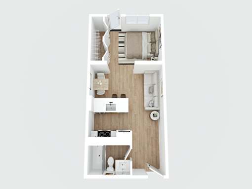 A top down view of a small apartment with a kitchen, living room and bathroom.