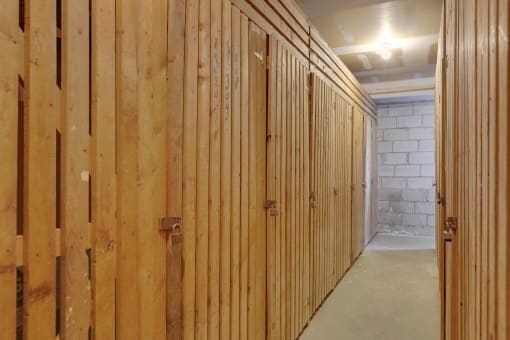 a row of wooden lockers in a gym