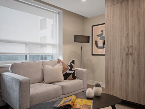 a living room with a couch and a coffee table
