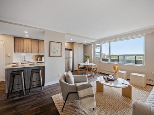 a living room and kitchen in a 555 waverly unit