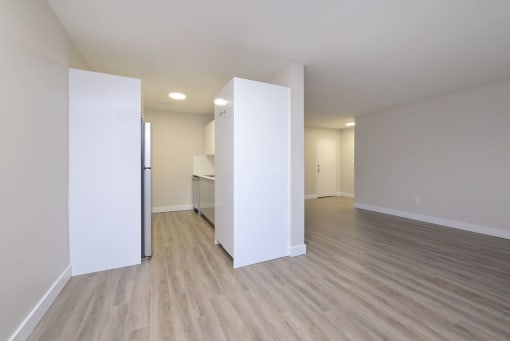 a kitchen and living room in a 555 waverly unit
