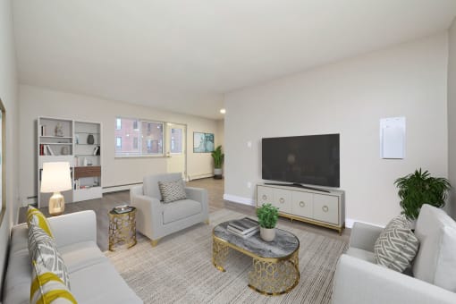 a living room with couches and a coffee table