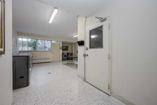 a laundry room with a washer and dryer