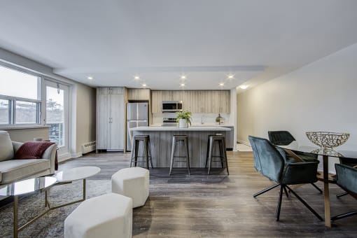 a kitchen and living room with a large island