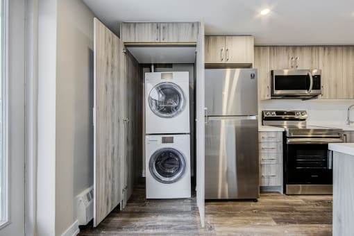 a small laundry room with a washer and dryer