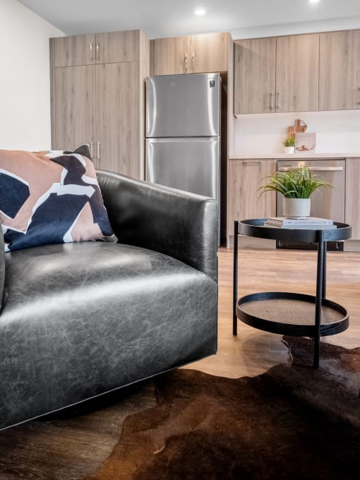 a living room with a couch and a table