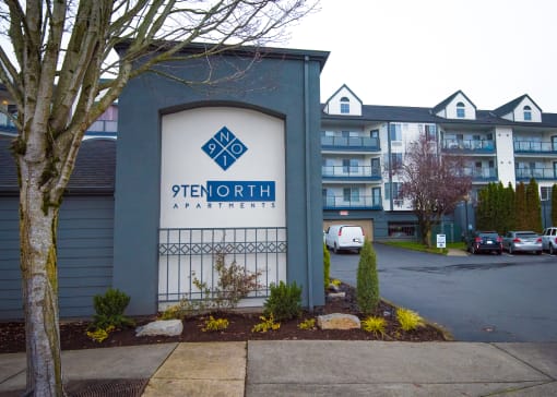 an apartment building with a sign that reads cyber north apartments