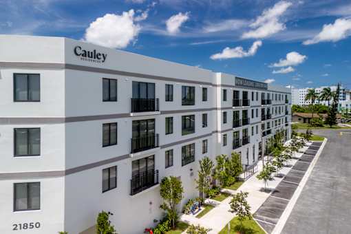 A modern building with the name Cauley on the top left corner.
