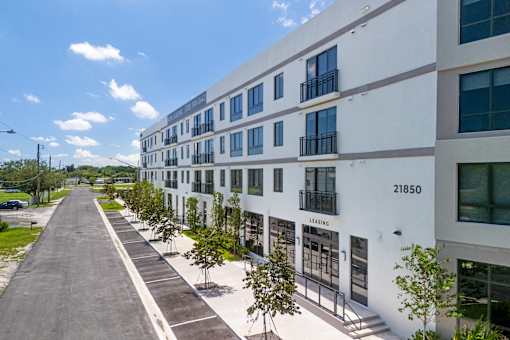 A street view of a building with the number 21850 on it.