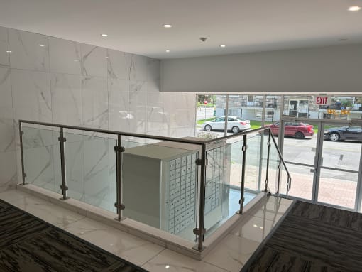 a view of the lobby from the top of the stairs