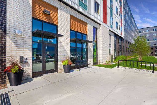 new building with entrance and patio in the city stock photography