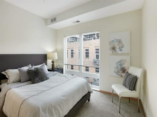 bedroom with window treatments