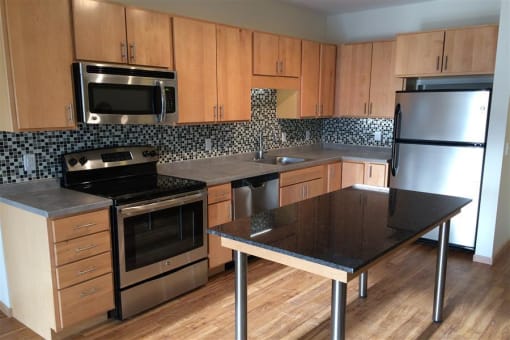Large kitchen with movable island