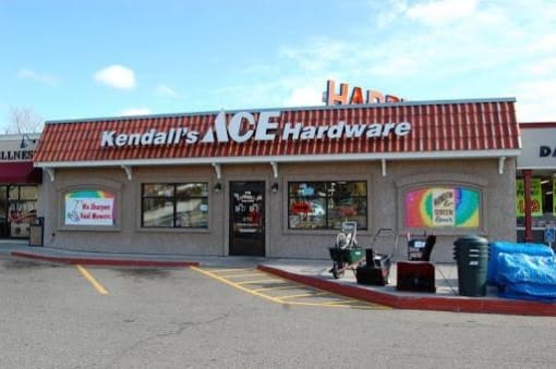 a hardware store with a sign on the front of it