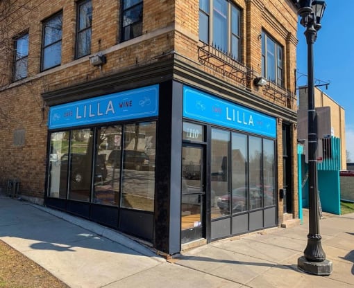 a building with a blue sign on the front of it