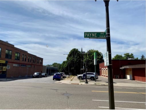 a street sign on a pole on a street
