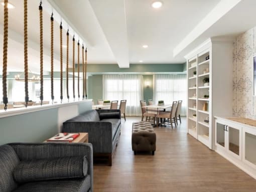 Nautical clubroom with seating and bookshelves