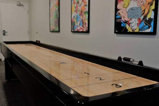 A pool table with numbers 1 and 3 on it.