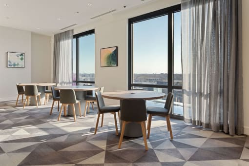 a room filled with furniture and a large window at Platform 4611, Chicago, IL 60640