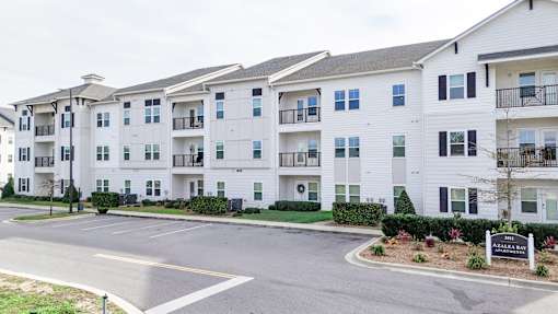Apartment complex with a sign that says "Avalon".