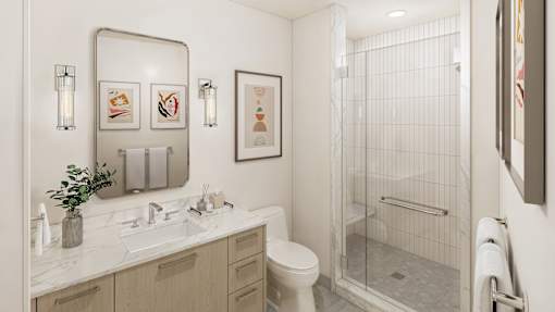 A bathroom with a white toilet, sink, and shower.