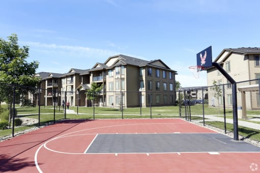 A basketball court at the whispering winds apartments in pearland, tx