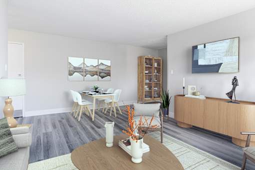 A modern living room with a wooden coffee table and a grey sofa.