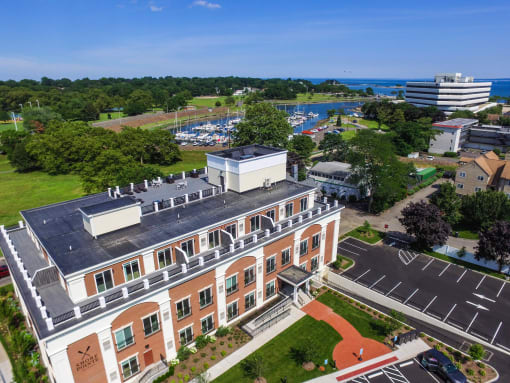 arial view of the building with the marina in the background
