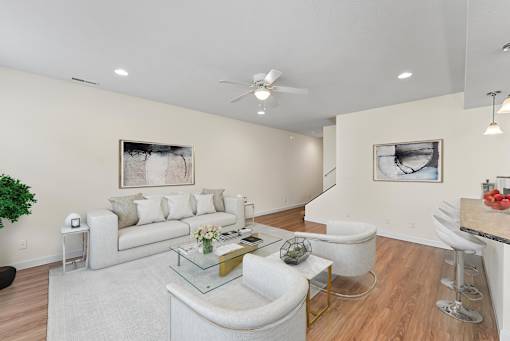 a living room with two couches and a coffee table