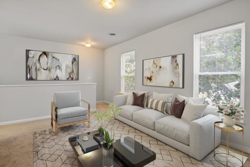 a living room with a couch and a chair