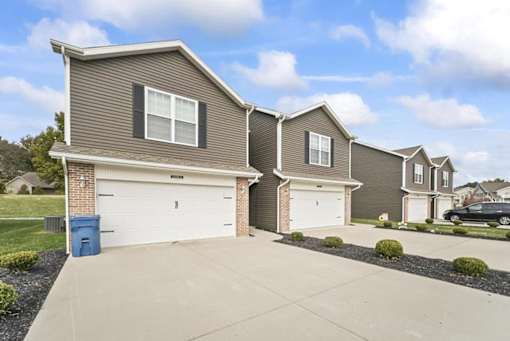 a house with a driveway in front of it