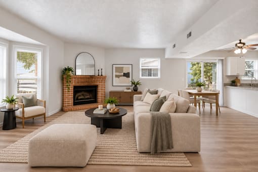 A living room with a fireplace and a couch.