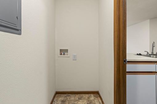 A bathroom with a sink and a mirror.