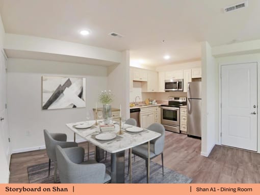 an open kitchen and dining room with a table and chairs