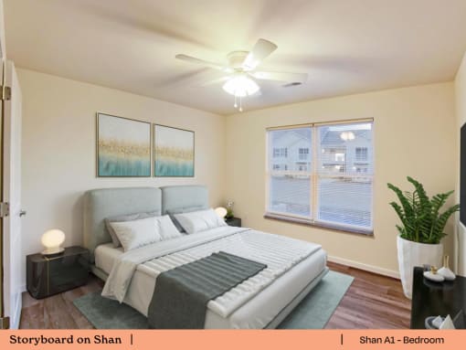a bedroom with a large bed and a ceiling fan