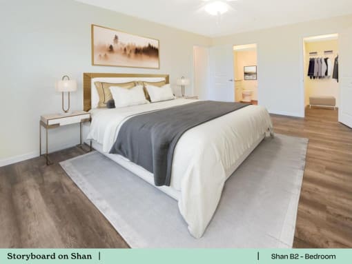 a bedroom with a bed and a rug