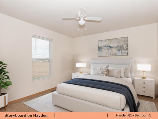 a bedroom with a bed and a ceiling fan