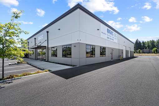 A large white building with the word "WARE" on the side.