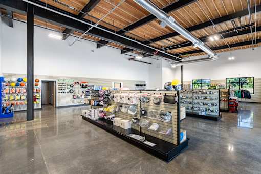 A hardware store with a variety of tools and equipment on display.