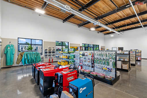 A hardware store with a variety of tools and equipment on display.
