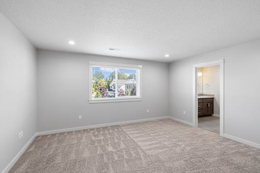 Primary Bedroom, Carpet and Natural Lighting