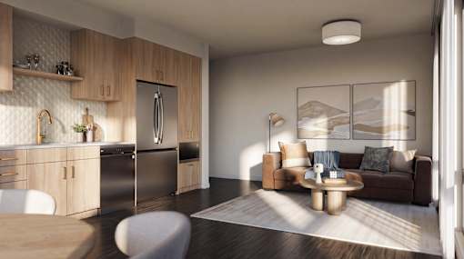A modern kitchen with a refrigerator, sink, and a dining table with chairs.