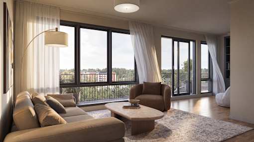 A modern living room with a large window and a view of trees and a fence outside.
