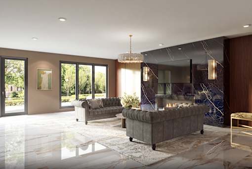 A modern living room with a grey sofa and a chandelier.