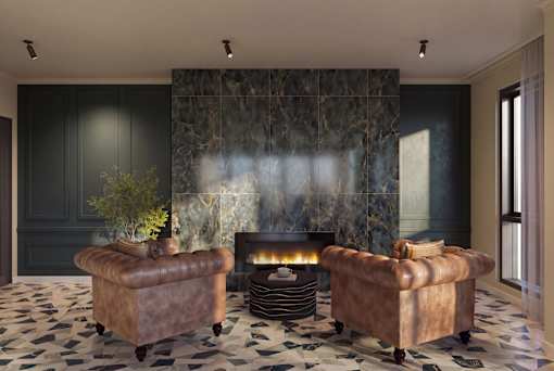 A living room with a fireplace and two brown leather chairs.